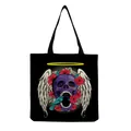 Detailed view of black tote bag featuring a gothic purple skull and wing print - Purple Skull with White Wings and Red Flowers (hm6652)