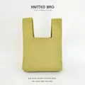 Pastoral style green knitted wrist bag with textured knit fabric for gift packaging - Yellow