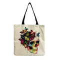 Close-up of a linen tote bag featuring a vibrant skull and butterfly artistic print - Colorful Ink Style Skull and Butterfly Pattern (hm6670)