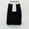 Borsa da polso in maglia nera di alta qualità per donna con design minimalista chic - Nero (Tinta unita)