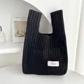 Borsa in maglia nera traforata per confezioni regalo festive - Nero Intagliato