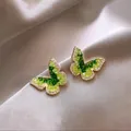 Exquisite butterfly stud earrings with green crushed crystals and pavé stones. - Light Green Butterfly (925 Sterling Silver Earring Post)