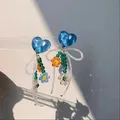 Exquisite blue heart stud earrings with colorful beaded flowers and bow detail - Heart Flower Beaded (925 Sterling Silver Earring Post)