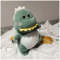 Detailed side view of a cute green plush dinosaur crossbody bag with yellow straps - Green