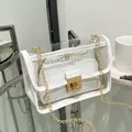 Elegante borsa a tracolla jelly trasparente con pochette interna bianca e catena oro - Bianco