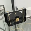 Borsa a tracolla in PVC trasparente alla moda con catena dorata e pochette interna nera - Nero
