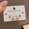 Close-up of gold-plated clover stud earring set with shimmering cubic zirconia - 12# Gold - Full Diamond Four-leaf Clover Three-piece Earring Set (thickened Real Gold Plating)