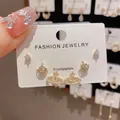 Elegant three-piece stud earring set in gold finish featuring sparkling planet designs - 37# Gold-tone Zircon Saturn Three-piece Earring Set (thickened Real Gold Plating)