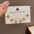 Elegant 6-piece gold-tone star stud earring set with sparkling crystals on jewelry card - 38# Gold-plated Diamond-encrusted Metal Star Three-piece Earring Set (thickened Real Gold Plating)