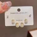 Elegant three-piece earring set featuring cluster pearl drops and sparkling cubic zirconia studs - 39# Gold-pearl Lucky Bag Three-piece Earring Set (thickened Real Gold Plating)