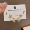 Exquisite Korean style three-piece earring set featuring pearls and sparkling crystals - 42# Gold - Full Diamond Flower And Cherry Three-piece Set (thickened Real Gold Plating)