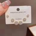 Elegant set of three pairs of round crystal stud earrings in a brilliant gold finish. - 43# Gold - Fully Diamond Round Three-piece Set Of Stud Earrings (thickened Real Gold Plating)