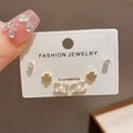 Elegant set of three pairs of minimalist stud earrings with clover and pearl accents - 44# Gold-tone Metallic Four-leaf Clover Chanel-style Earring Set (thickened Real Gold Plating)