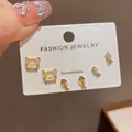 Elegant 3-pair gold stud earring set featuring crystal cat and fish bone designs. - 50# Gold - Kitten Fish Three-piece Set (thickened Real Gold Plating)