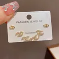 Elegant gold-tone 3-pair fashion stud earring set featuring interlocking C logo design - 51# Gold - Fully Diamond Chanel-style Cross Three-piece Earring Set (thickened Real Gold Plating)