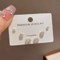 Elegant 3-pair stud earring set featuring small pearls and faceted clear sparkling crystals. - 54# Gold-plated Zircon Bead Earring Set (thickened Real Gold Plating)