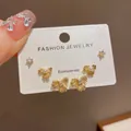Elegant set of three gold-tone stud earrings featuring bow knots and sparkly rhinestones - 66# Gold-plated Diamond-encrusted Metal Trefoil Three-piece Earring Set (thickened Real Gold Plating)