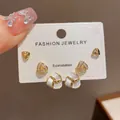 Elegant three-piece set of stud earrings featuring gold, rhinestones, and white enamel - 81# Gold - Wrapped Triangle Set Earrings (thickened Real Gold Plating)