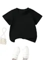 Minimalist kids solid black cotton T-shirt flat lay with white pearl bag and sneakers - Black