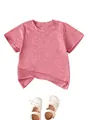 Pink short-sleeved children's T-shirt paired with elegant white bow-tie shoes. - Peach