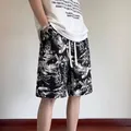 Short décontracté pour homme avec imprimé floral à l'encre noir et blanc et cordon - M / Noir