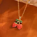 Cute minimalist gold necklace with double red strawberry pendant in a pastoral style - Gold Double Strawberry Style (TL9344)