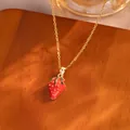 Elegant gold-tone chain necklace featuring a cute and realistic red strawberry pendant - Gold Textured Strawberry Style (TL9346)