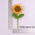 Handmade crochet sunflower shown with measurement rulers, weighing about 12 grams - 5-ring 10-petal Sunflower Stalk (2 Leaves)