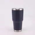 A detailed close-up shot of a 30oz navy blue vacuum insulated stainless steel tumbler. - 30oz / Dark Blue
