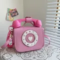 Creative pink vintage telephone-shaped crossbody bag with rotary dial detail - Small / 20x16x10cm / Pink