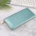 Shiny turquoise crocodile pattern long wallet for women with gold zipper closure - Light Blue