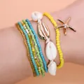 Boho-Armband-Set mit bunten Perlen, natürlichen Muscheln und goldenen Seestern-Anhängern - AB915-03 Gelb