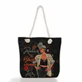 Close-up of black tote bag with rope handles and Rockin The Black Woman Life print - 45*35*12 / Black Art Text Woman Style (Style 4)