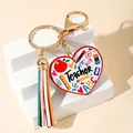 Heart-shaped teacher appreciation keychain with colorful leather tassel and school icons - Heart Teacher Pattern with Tassel (1)