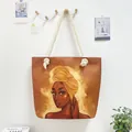 Artistic canvas tote bag featuring an African woman print and thick rope handles. - 45*35*12 / Warm Brown Golden Headscarf Portrait Style (Style 5)