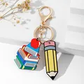 Teacher appreciation keychain featuring colorful book stack and pencil charms in gold finish - Books Apple & Yellow Pencil Style (7)