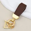 Brown goat grain leather car keychain with gold hardware bag charm accessory - Independent Matte Bag Packaging / Pearl Gold-Coffee