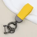 Yellow goat grain leather car keychain with dark grey matte metal hardware rings - Independent Matte Bag Packaging / Pearl Matte Gun-Yellow