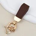 Short brown goat grain leather keychain with elegant gold-tone hardware for car keys - Independent Matte Bag Packaging / K Gold-Coffee