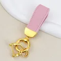 Pink goat-pattern leather car keychain with gold-plated horseshoe D-ring buckle - Independent Matte Bag Packaging / Gold-Pink