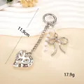 Stylish silver keychain with heart and bow charms featuring elegant pearl strand decoration - Small Pendant / Crater Heart Charm(K6029)