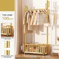 Heavy-duty golden metal garment rack with bottom storage basket and universal wheels - 100cm 32 Round Gold Cactus Rack