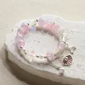 Elegant pink crystal beaded bracelet with starfish and shell charms in a sweet fairy style - Pearl Shell - Purple
