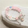 Sweet pink crystal beaded bracelet with ocean shell and star charms for elegant women - Pearl Shell - Pink