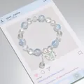 Elegant fairy-style light blue and clear crystal beaded bracelet with silver butterfly charm - Sparkling Butterfly Ice Blue