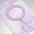 Sweet purple crystal beaded bracelet with butterfly charms on display card - Ink Butterfly Rose Purple