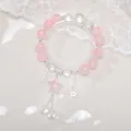 Sweet pink crystal beaded bracelet with star charms and delicate lace background - Aurora Sea Star Bracelet Pink