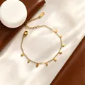 Elegante collana in acciaio al titanio placcato oro 18 carati con ciondoli a goccia - Bracciale a Goccia - Oro (C385)