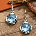 Vintage Bohemian silver-tone drop earrings with multifaceted light blue gemstones - White K (A-1035)
