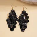 Orecchini bohémien neri con nappine a disco in finta conchiglia per la vacanza - Stile Gancio per Orecchio / Nero